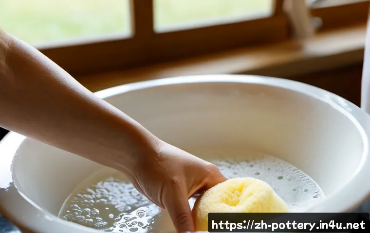 도자기 세척 및 관리법 - Photorealistic close-up of clean white porcelain bowls and cups being gently hand-washed in a farmho...